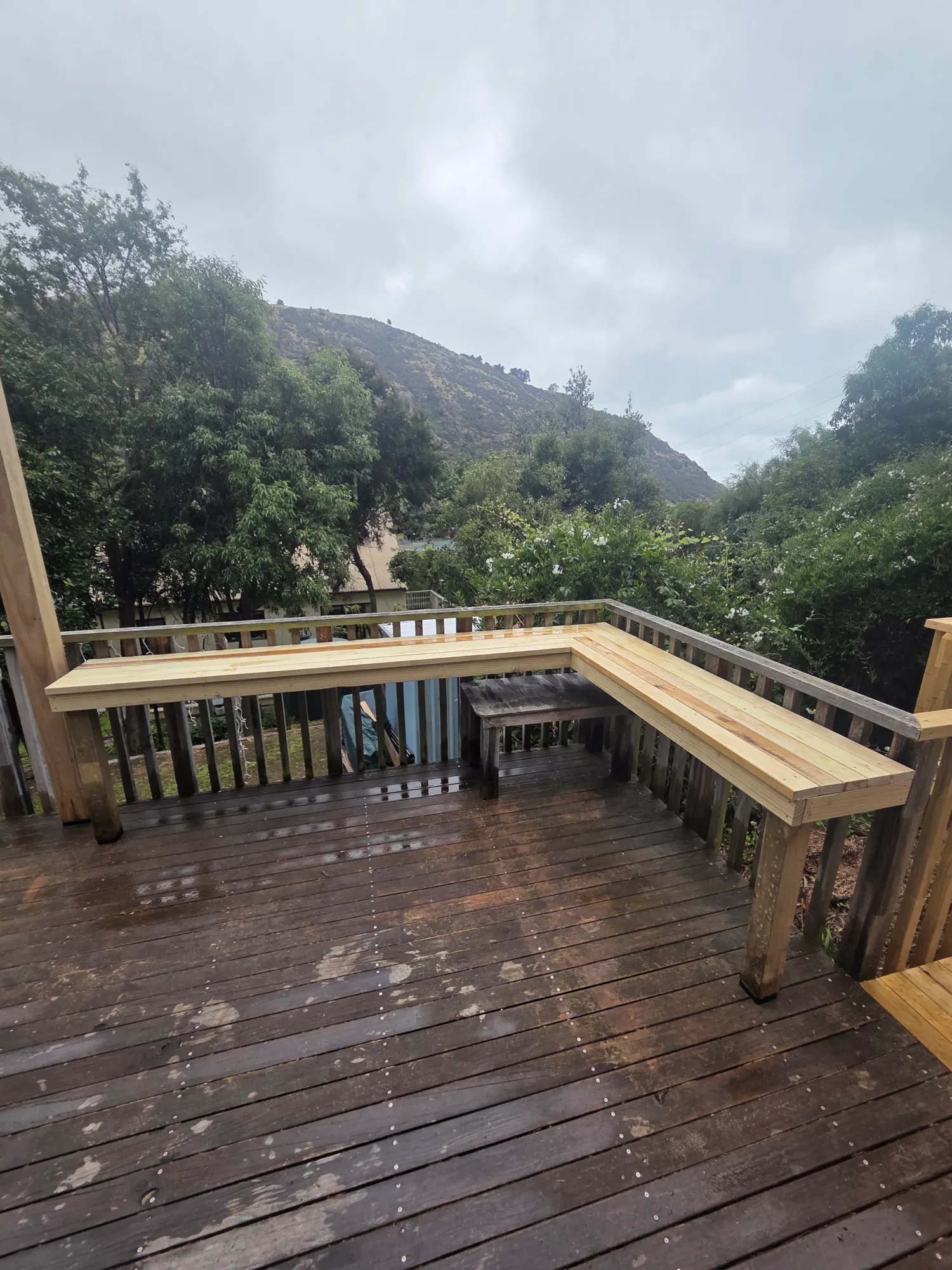 Deck with bench seating and pergola